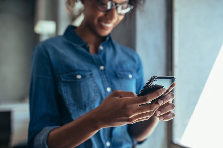 Woman Texting on a Smartphone 